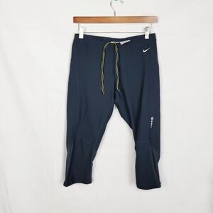 Women's Medium Nike Black Athletic Capri Leggings with Yellow Drawstring